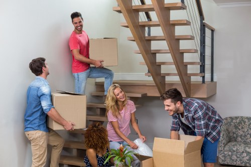 Careful furniture handling during a house removal in North West London