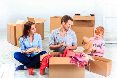 Flat move in Colindale showing careful handling of furniture and stairs