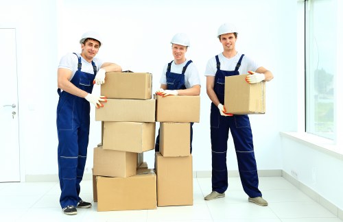 Team handling furniture in a Colindale apartment move