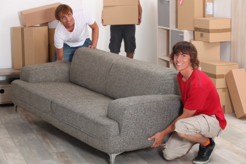 Professional man and van moving items in North West London